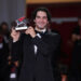 Benny Safdie poses with the Silver Lion for Best Director for "The Smashing Machine" during the winners photocall at the 82nd Venice International Film Festival on Saturday. Photo by Rocco Spaziani/UPI