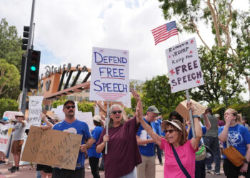 Demonstrators picket in response to the suspension of Jimmy Kimmel's late-night show outside of Walt Disney Studios in Burbank, Calif., on Thursday, Sept. 18, 2025. (AP Photo/Jae C. Hong)
