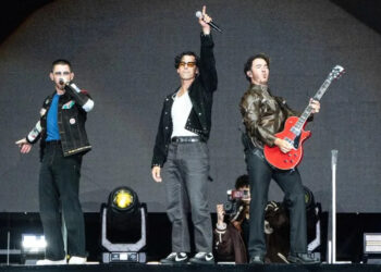 Nick Jonas, left, Joe Jonas, and Kevin Jonas of The Jonas Brothers perform during Festival d'ete de Quebec on Saturday, July 6, 2024, in Quebec City. (Photo by Amy Harris/Invision/AP)