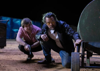 [L-R] Jeremy Ray Taylor as “Julian” and Josh Duhamel as “Tommy Ward” in the action comedy LONDON CALLING, a Quiver Distribution release (Quiver Distribution)