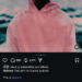 A person in a pink hoodie with a blurred face, against a colorful, abstract background.