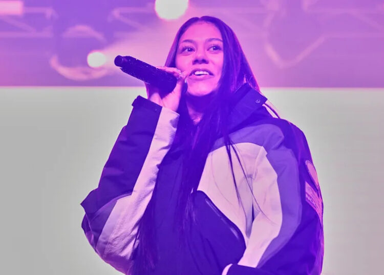 Karrahbooo performs on stage.