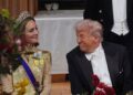 U.S. President Donald Trump, centre, and Kate, Princess of Wales, listens to Britain's King Charles during the State Banquet in Windsor Castle, England, on day one of U.S. President Donald Trump and First Lady Melania Trump's second state visit to the UK, Wednesday Sept. 17, 2025. (Yui Mok/PA via AP, Pool Photo via AP)