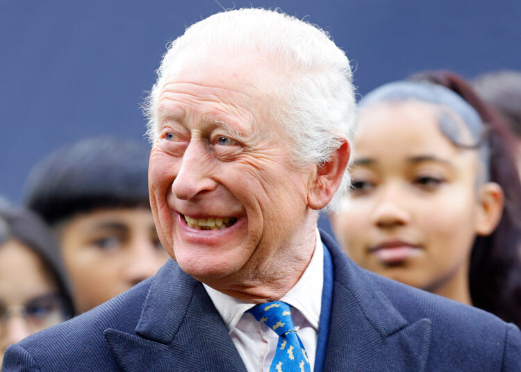LONDON, UNITED KINGDOM - FEBRUARY 12: (EMBARGOED FOR PUBLICATION IN UK NEWSPAPERS UNTIL 24 HOURS AFTER CREATE DATE AND TIME) King Charles III attends a demonstration by young people involved in The Huddle Project during a visit to Tottenham Hotspur Stadium on February 12, 2025 in London, England. The Huddle Project is a dual sport programme (launched in 2023 by Tottenham Hotspur Football Club, the National Football League (NFL) and Nike) for boys and girls aged 11-18 which increases access to free football and NFL Flag. (Photo by Max Mumby/Indigo/Getty Images)
