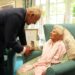 King Charles III meets the world's oldest person, 116-year-old Ethel Caterham, at Hallmark Lakeview Care Home in Lightwater