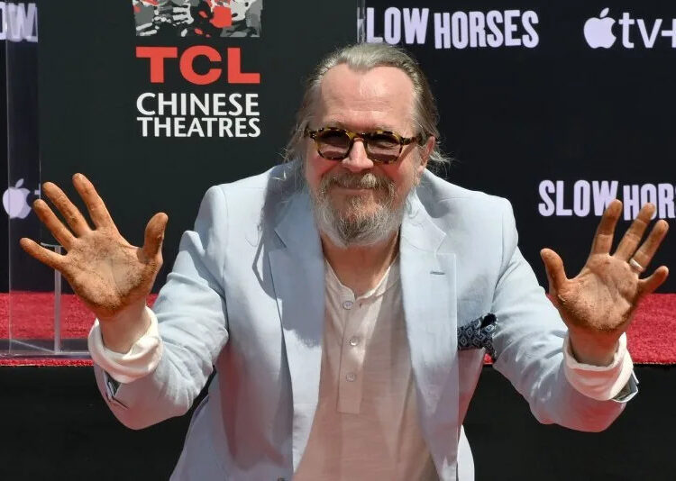 English actor Gary Oldman participates in a hand and footprint ceremony immortalizing him in the forecourt of the TCL Chinese Theatre on Aug. 22. He stars in "Slow Horses." File Photo by Jim Ruymen/UPI