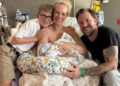 The Kelley Family The Kelley family with their newborn.