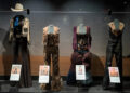 Clothing on display at the Lainey Wilson: Tough as Nails exhibition at the Country Music Hall of Fame in Nashville, Tenn., Thursday, July 17, 2025.