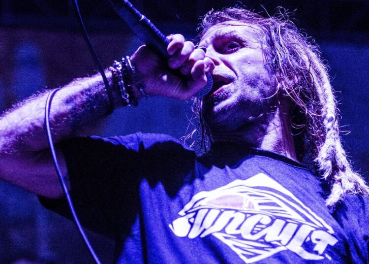 Randy Blythe performing onstage with Lamb Of God in 2017