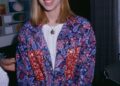 American singer-songwriter Debbie Gibson wearing a wide-brim hat with a blue paisley pattern shirt over a white t-shirt, circa 1989.