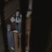 Lorraine (Vera Farmiga, left) sticks close to protect daughter Judy (Mia Tomlinson) from evil in "The Conjuring: Last Rites."
