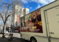 A Warner Bros. van sits in front of the Bob Hope Theatre in downtown Stockton on Monday, Feb. 5, 2024.