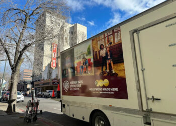 A Warner Bros. van sits in front of the Bob Hope Theatre in downtown Stockton on Monday, Feb. 5, 2024.