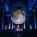 A band performing under the Museum of the Moon at the Burns & Beyond Festival.