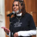 Taylor Hall, an "artivist," speaks during the "Crossroads of Democracy: Day of Action" event at the Indiana Statehouse, Saturday, Oct. 17, 2020.  The event aims to empower young activists fighting for equity, equality, social and economic justice, and generational change in politics. Artivism, Indiana Nasty Women, and Indiana Black Legislative Caucus are hosting the event.