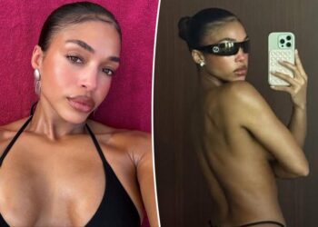Lori Harvey strikes a sultry pose in a Gucci G-string (and no top) during tropical vacation