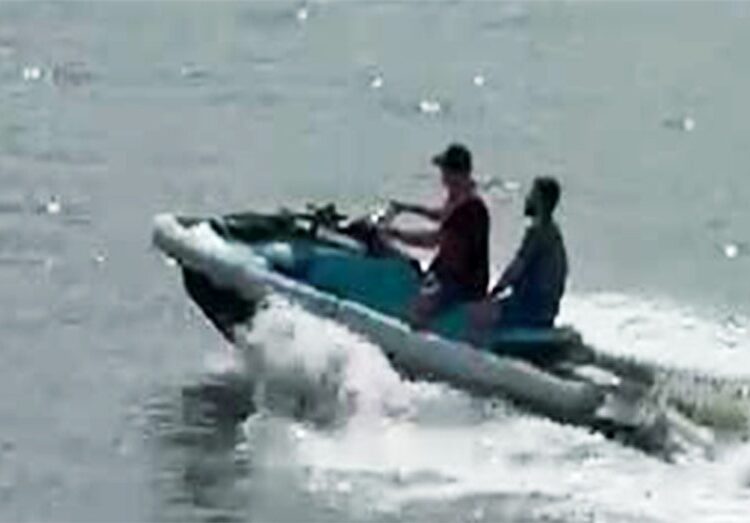 Jey Gonzalez-Diaz on jet ski after jumping off cruise ship