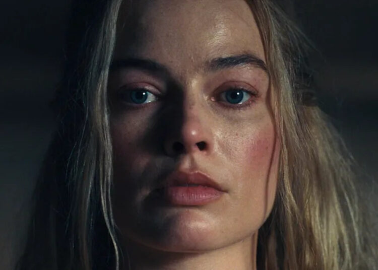 Margot Robbie spacing out in Wuthering Heights.