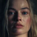 Margot Robbie spacing out in Wuthering Heights.