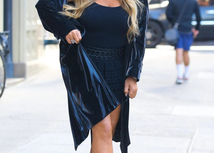 Mariah Carey is all smiling while heading to The Tonight Show Starring Jimmy Fallon in NYC