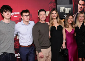 Mark Wahlberg and his wife attend a premiere with their children
