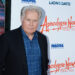 Martin Sheen poses in a blazer and blue plaid shirt at the Apocalypse Now: Final Cut screening event.