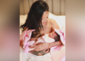Rihanna shared on social media on Sept 24 a photo showing her carrying her newborn daughter.