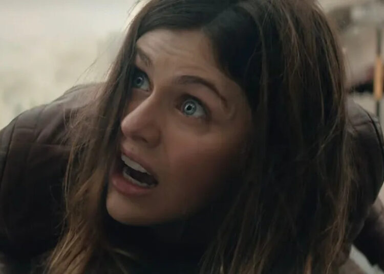 Alexandra Daddario looking scared on the ground in San Andreas.