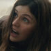 Alexandra Daddario looking scared on the ground in San Andreas.
