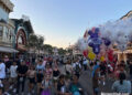 crowds on Disneyland Main Street U.S.A. early evening
