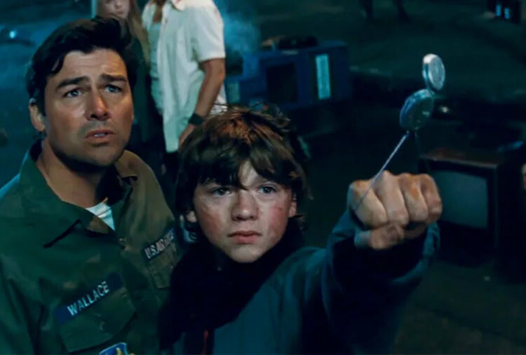 Kyle Chandler and Joel Courtney in <em>Super 8</em>.