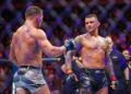 Nov 12, 2022; New York, NY, USA; Dustin Poirier (red gloves) defeats Michael Chandler (blue gloves) during UFC 281 at Madison Square Garden.