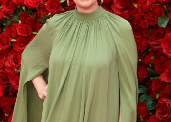 Olivia Colman feels like she's being "unfaithful" when performing intimate scenes on-camera.