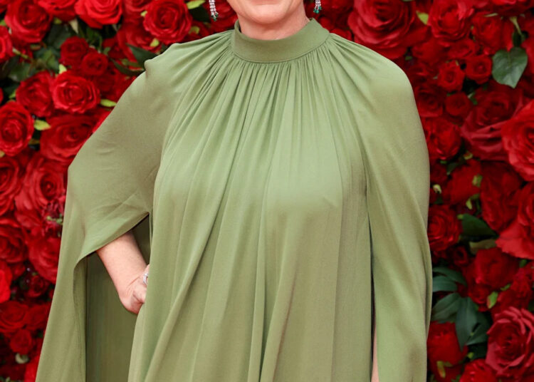 Olivia Colman feels like she's being "unfaithful" when performing intimate scenes on-camera.