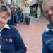 Zoe Cutting and Simon Smith queuing outside Resident Music in Kensington Gardens, Brighton and Hove. Both are wearing button up jackets; Zoe's is corduroy and Simon's is denim. They are both sitting in camp chairs.