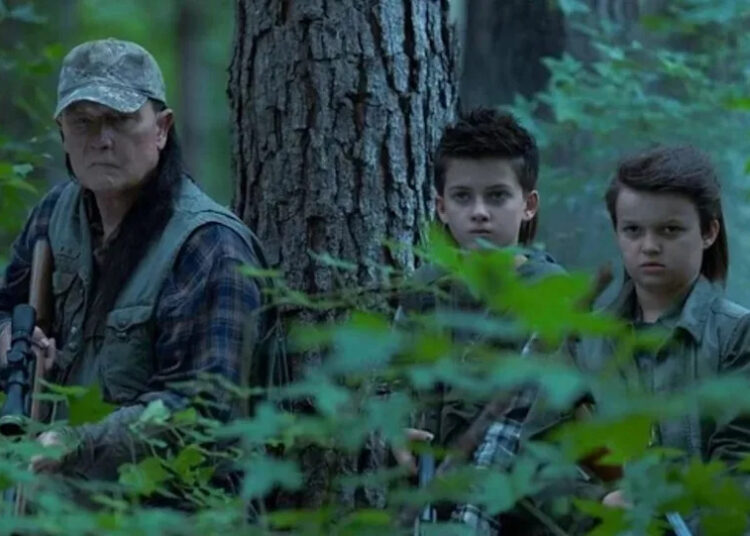 Robert Patrick as Auggie Smith with his kids in a flashback from Peacemaker season two,