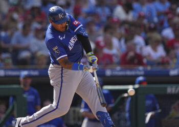 Kansas City Royals' Salvador Perez hits a three-run home run off of Philadelphia Phillies pitcher Aaron Nola, Sunday, Sept. 14, 2025, in Philadelphia.