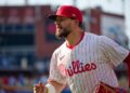 Jul 2, 2025; Philadelphia, Pennsylvania, USA; Philadelphia Phillies outfielder Kyle Schwarber (12) warms up before a game against the San Diego Padres at Citizens Bank Park. (Credit: Grace Del Pizzo-On Pattison)