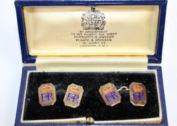 A pair of 9ct gold and enamel octagonal cufflinks with crowned ERII ciphers presented by Queen Elizabeth II to Squadron Leader Denis Lowery.