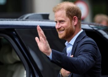 Britain's Prince Harry gestures, as he departs, following his visit to Centre for Blast Injury Studies at Imperial College London, in London, Wednesday, Sept. 10, 2025. (Suzanne Plunkett, Pool Photo via AP)