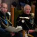 FILE - Britain's Prince William, known as the Duke of Rothesay while in Scotland, and King Charles III during the National Service of Thanksgiving and Dedication for King Charles III and Queen Camilla, and the presentation of the Honours of Scotland, at St Giles' Cathedral, in Edinburgh, Wednesday, July 5, 2023. Buckingham Palace says King Charles III will undergo a "corrective procedure" next week for an enlarged prostate. (Jane Barlow/Pool photo via AP, File)