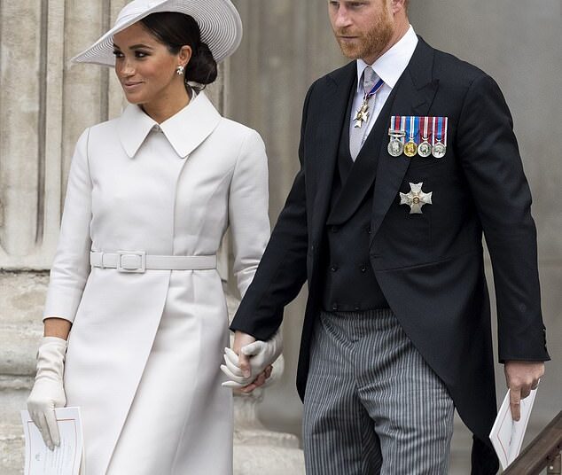 Prince Harry, Duke of Sussex and Meghan, Duchess of Sussex, attend a National Service of Thanksgiving for the Queens reign at St Pauls Cathedral on June 3, 2022. There were cheers but also boos from the crowds at the church