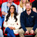 Prince Harry and Meghan Markle sitting together