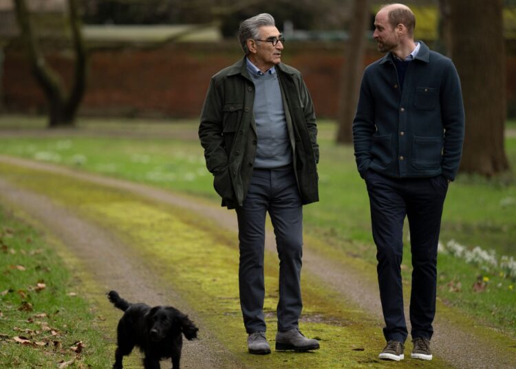 Eugene Levy and Prince William walk around Windsor with the Wales's dog, Orla