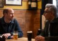 The Prince of Wales and Eugene Levy in a pub in Windsor. Pic: PA
