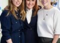 Princesses Beatrice and Eugenie have been left in a 'very difficult' position over their upcoming Christmas plans, a royal author has claimed. Pictured, the sisters with their mother, Sarah Ferguson, in London in April 2025
