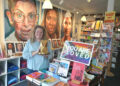 Michelle Axelson, owner of Womencrafts Provincetown retail store, holds the Jamie Lee Curtis Award For Gusto, Enthusiasm and Individuality she received in August from the Las Culturistas podcast hosts. The photo was taken Sept. 17, 2025, in the store in Provincetown.