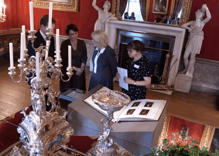 Queen Camilla views artifacts related to Jane Austen at The Queen's Reading Room Festival