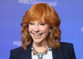 Reba McEntire smiling and posing at the 2024 TCA Summer Press Tour.