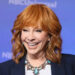 Reba McEntire smiling and posing at the 2024 TCA Summer Press Tour.